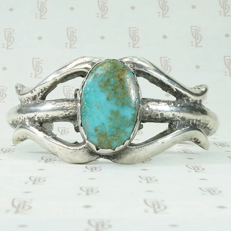 women’s antique bracelet-Mesmeric Turquoise in Sand Cast Silver Cuff