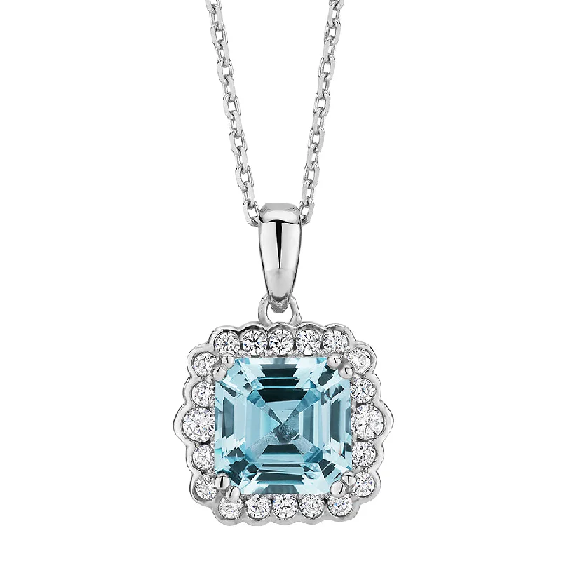 women’s classic chain necklace-Halo necklace with blue topaz simulant in sterling silver