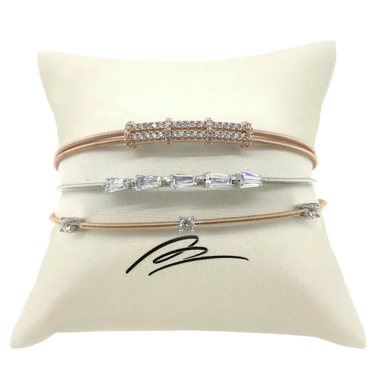 women’s custom bracelet-Rose Gold and Silver Tapered Baguette Stack