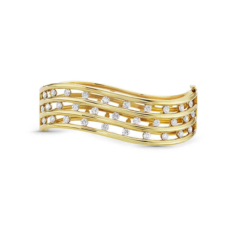 women’s handwoven bracelet-18k Yellow Gold Floating Diamond Cuff